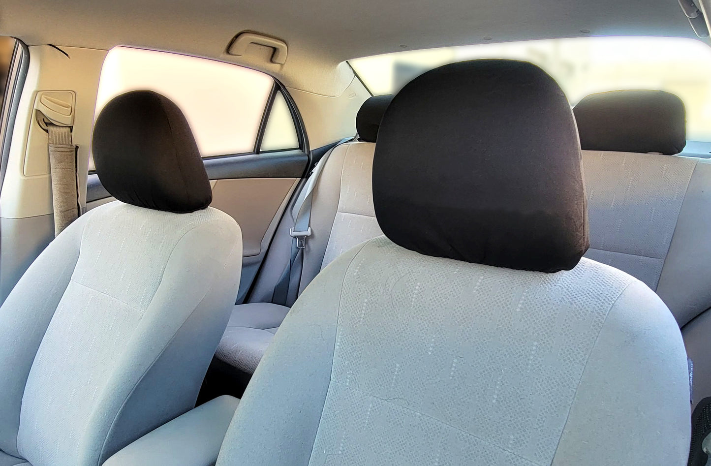 Headrest cover installed in the car